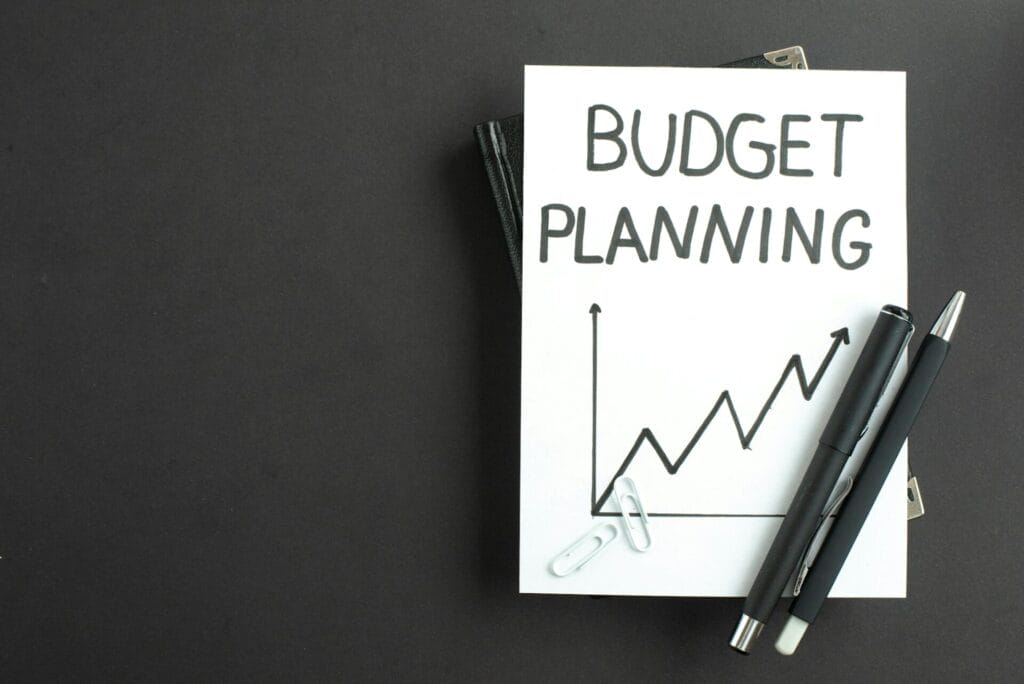 top view budget planning note with pens on dark background work plan job business office busy bank